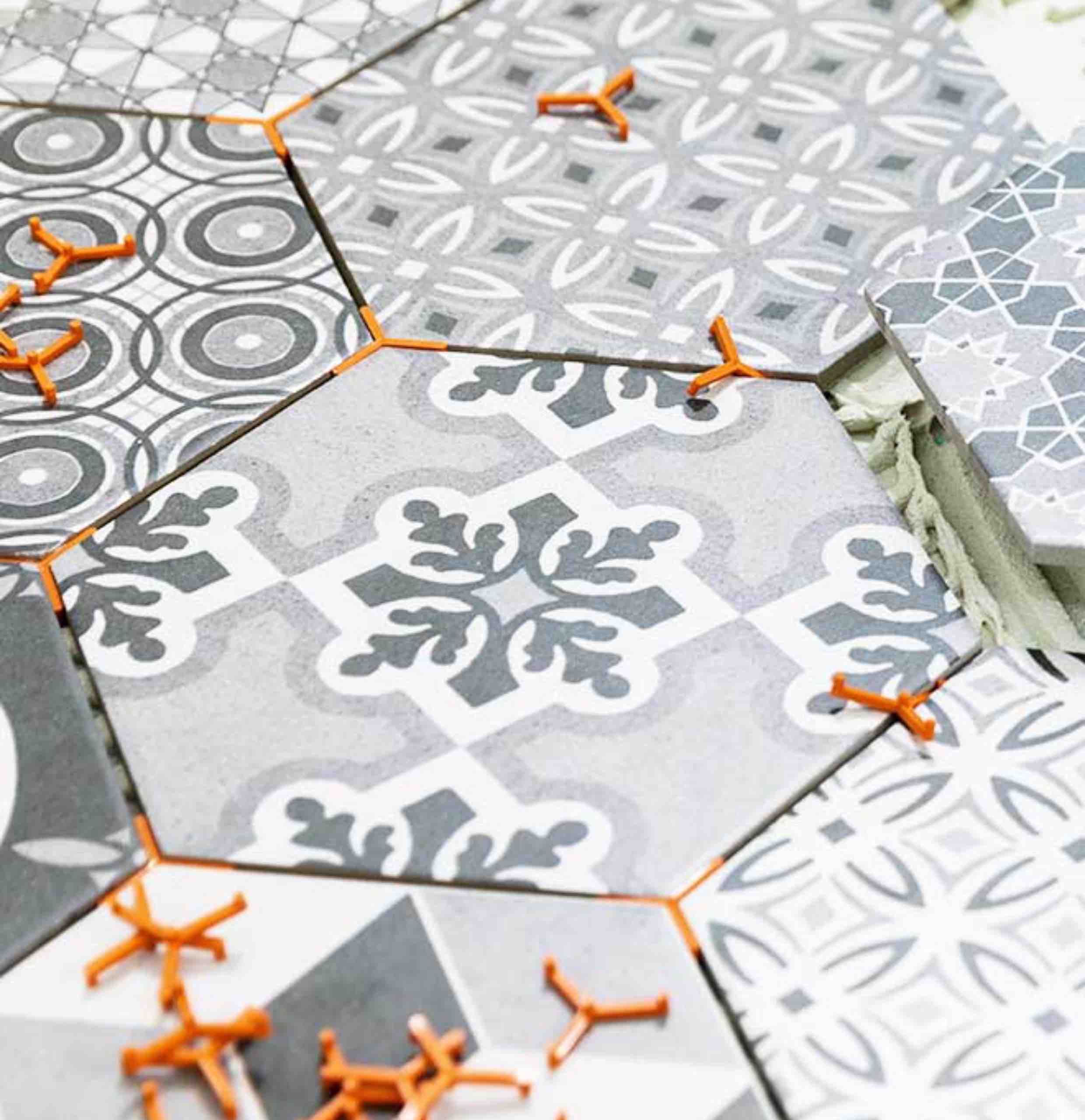 Trendy hexagonal tiles installed by Footprints Floors in Durham / Chapel Hill.