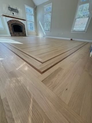 Beautiful white oak floors with walnut inlay. Finished with Bona ClearSeal and Bona MegaOne.  Two days start to finish.