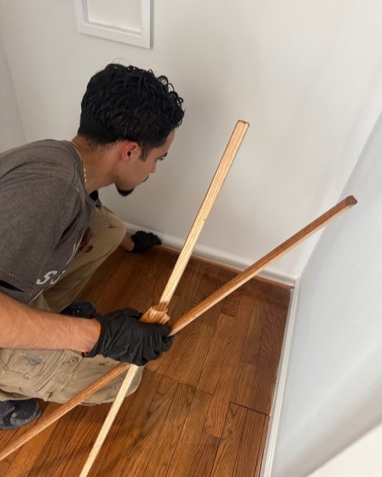 Here is one of our expert contractors carefully measuring and installing the shoe molding for our clients' freshly refinished hardwood floors!

Whether your floors need a full replacement or a new stain, our team's attention to detail and years of experience will always produce a five-star result.

If you have a project in mind, we'd love to talk to you! 
Click the link to visit our website and schedule a free estimate or to learn more.
https://tinyurl.com/ftprntsflrsfrfx

