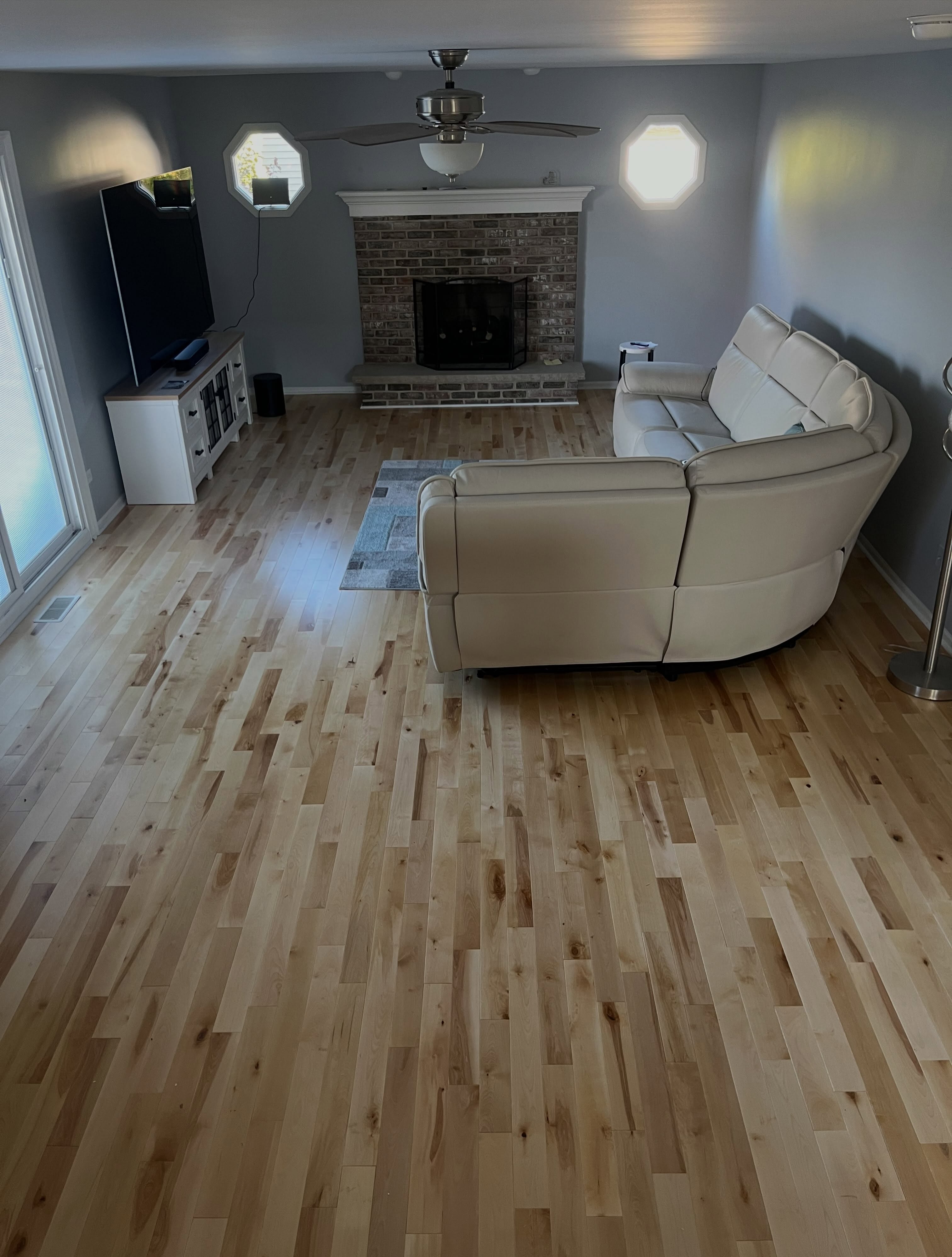 We removed the carpet and installed this beautiful prefinished hardwood. 
Give us a call for a free in-home estimate!
