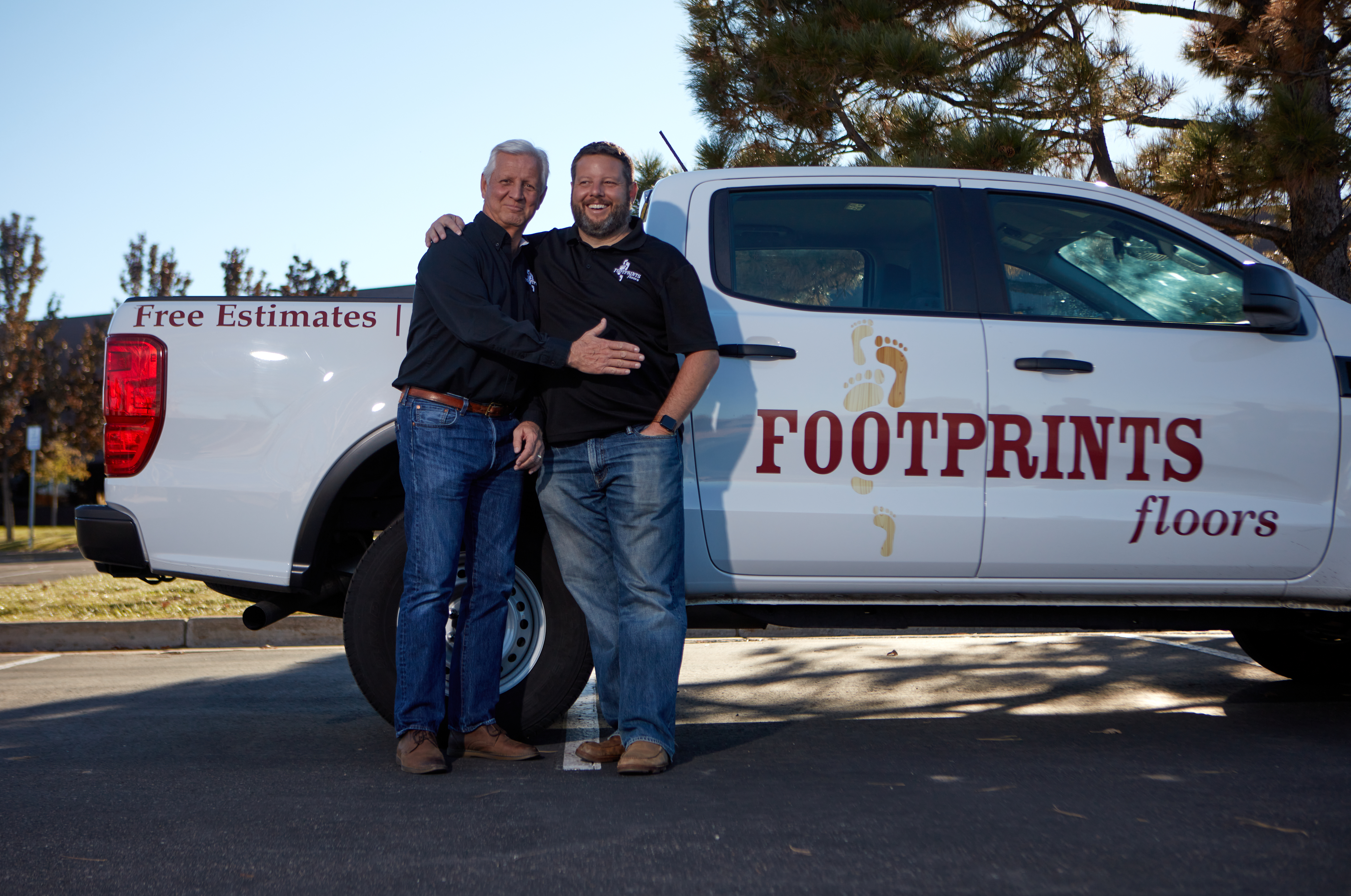Two Footprints Floors franchise owners.