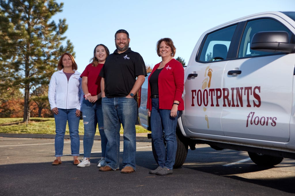 An image of a team of Footprints Floors partners.