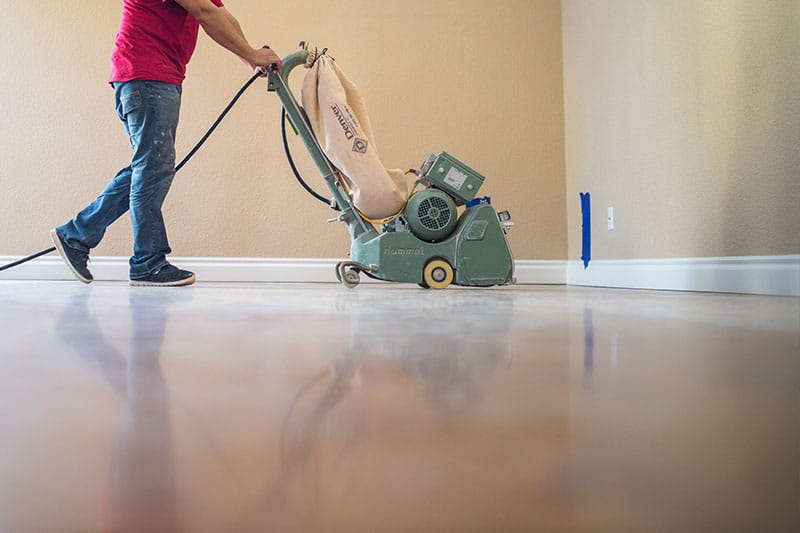 An image of tiles being refinished.
