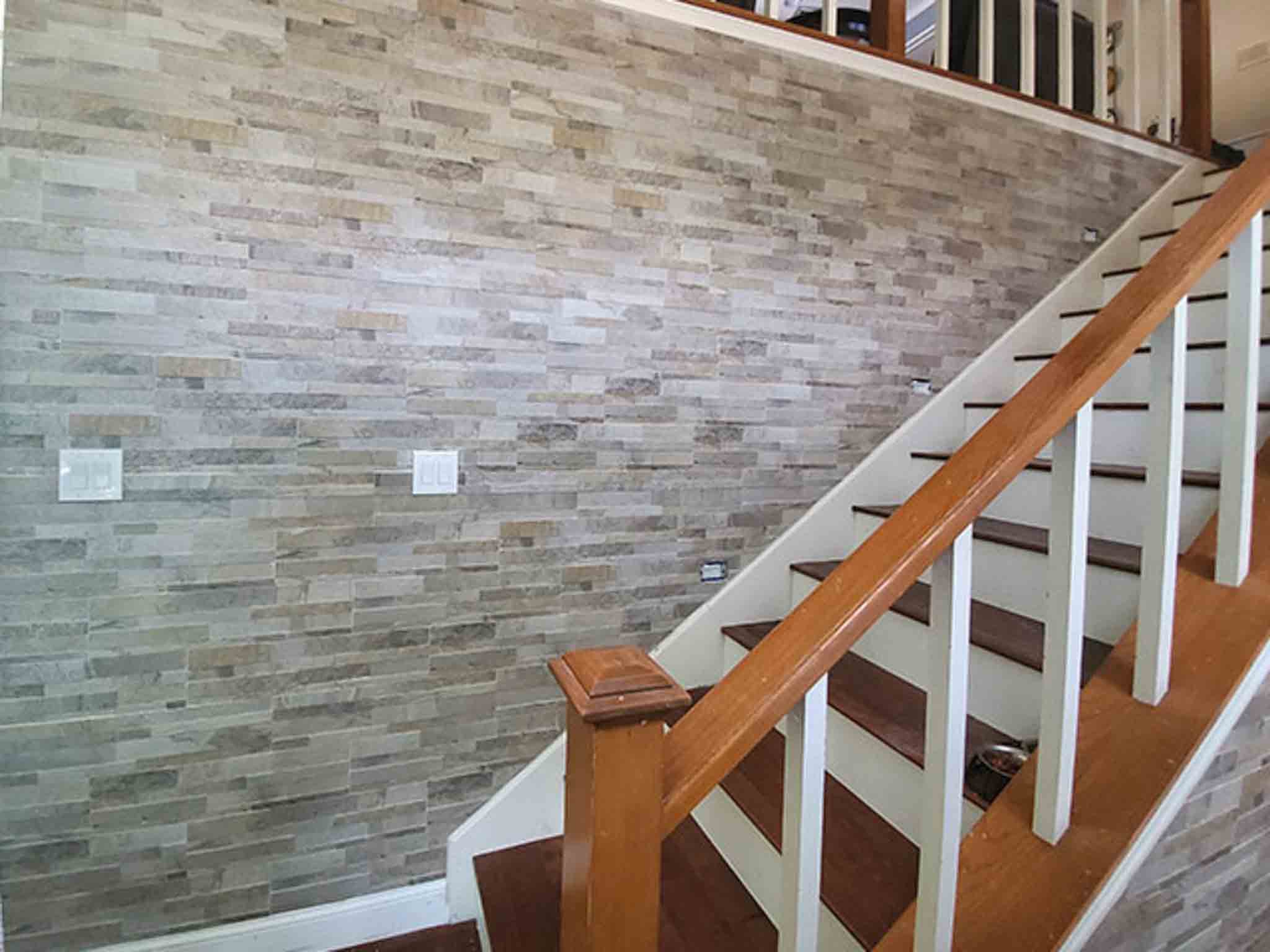 Wood flooring and stone backsplash, installed by Footprints Floors South Sacramento.
