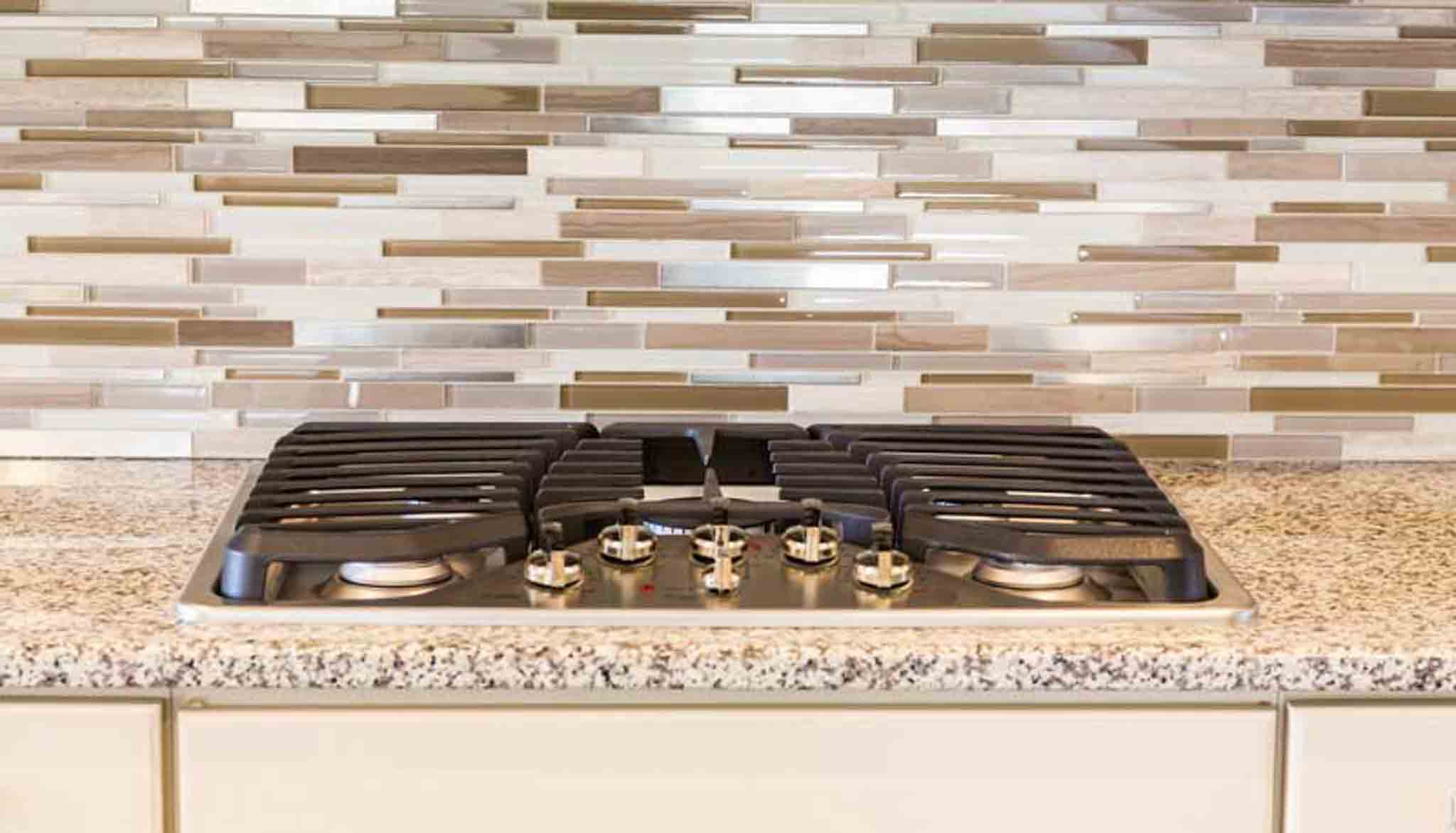 Brown backsplash in a kitchen, installed by Footprints Floors South Sacramento.