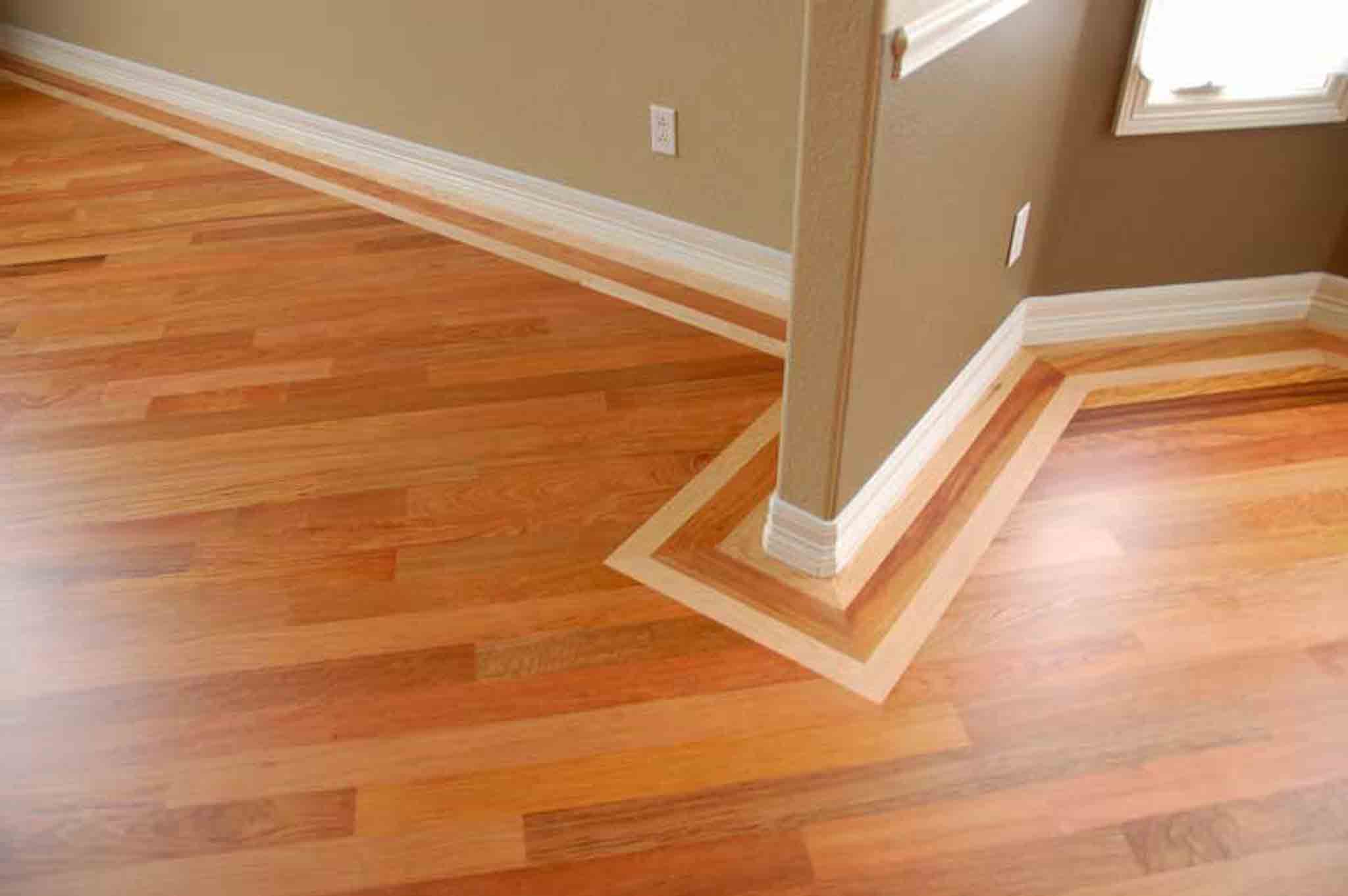 A light and dark brown wood pattern following the trim of the flooring.