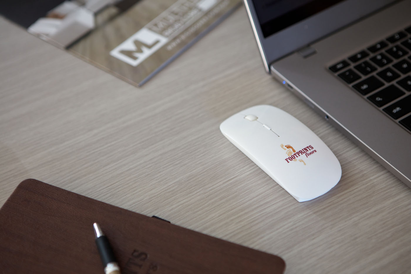 An image of Footprints Floors branded work items - take control of your life with a flooring business today.