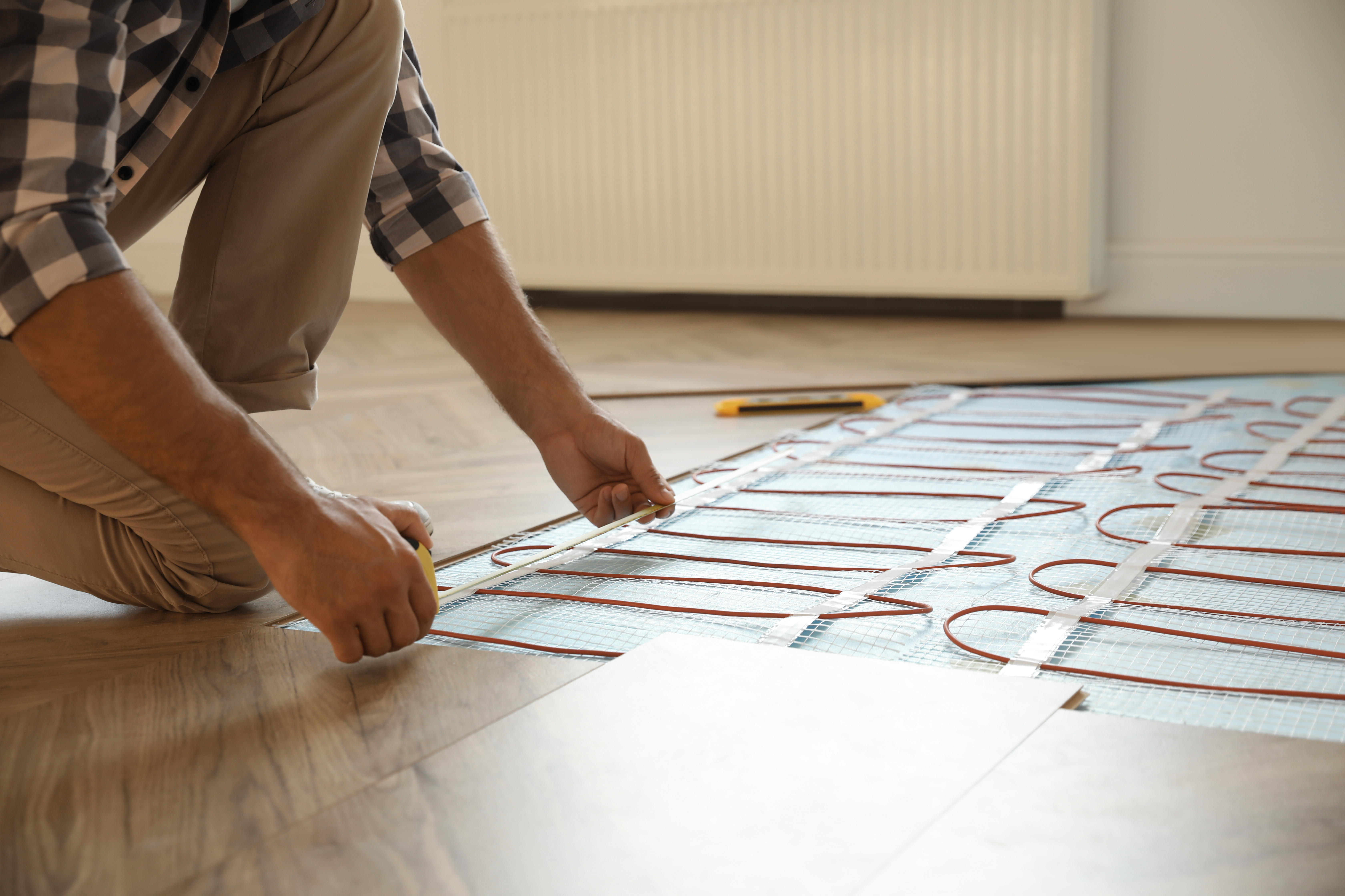 A contractor providing heated floor installation in Phoenix, AZ.