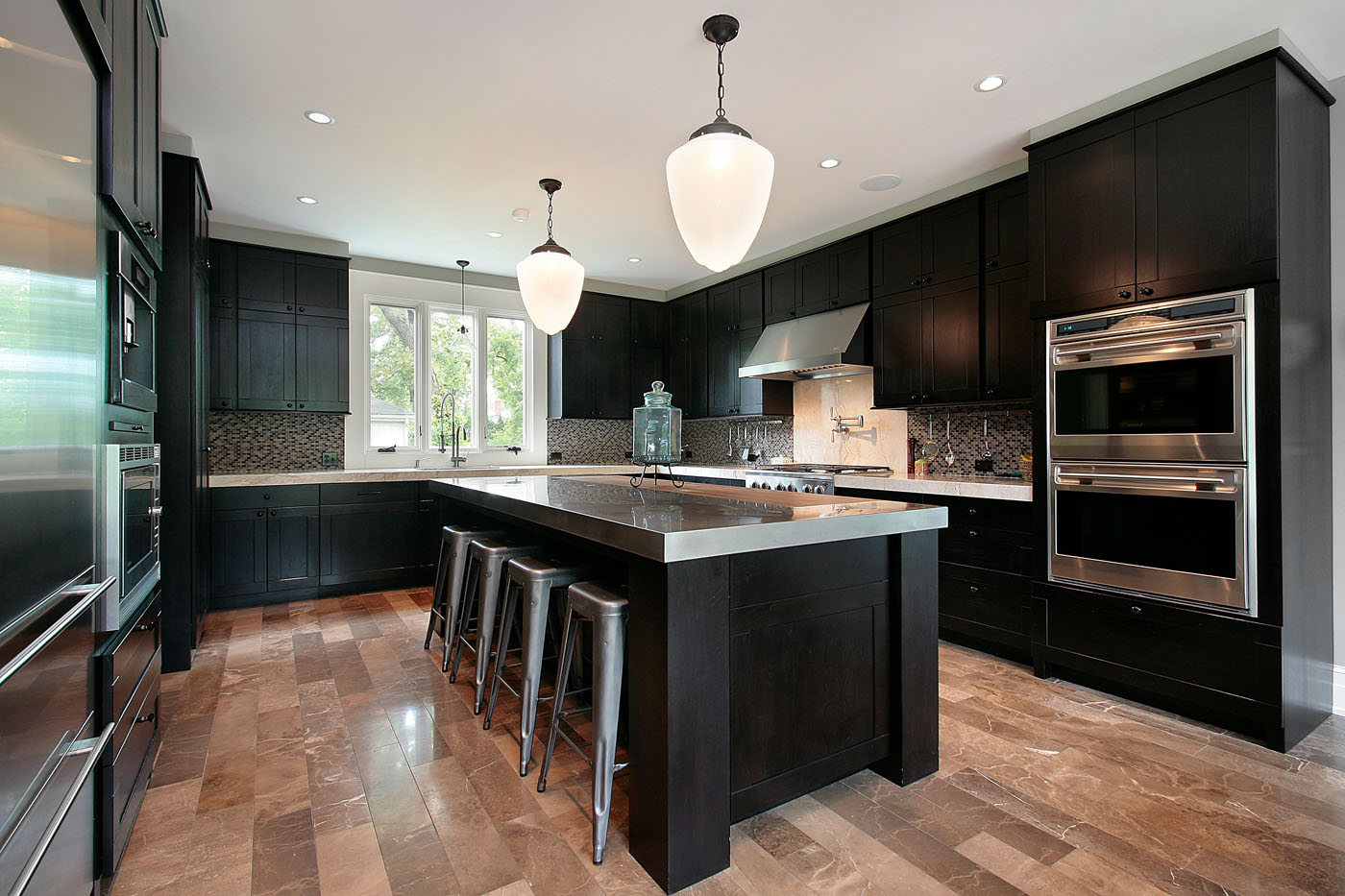 A stylish kitchen with hardwood floors.