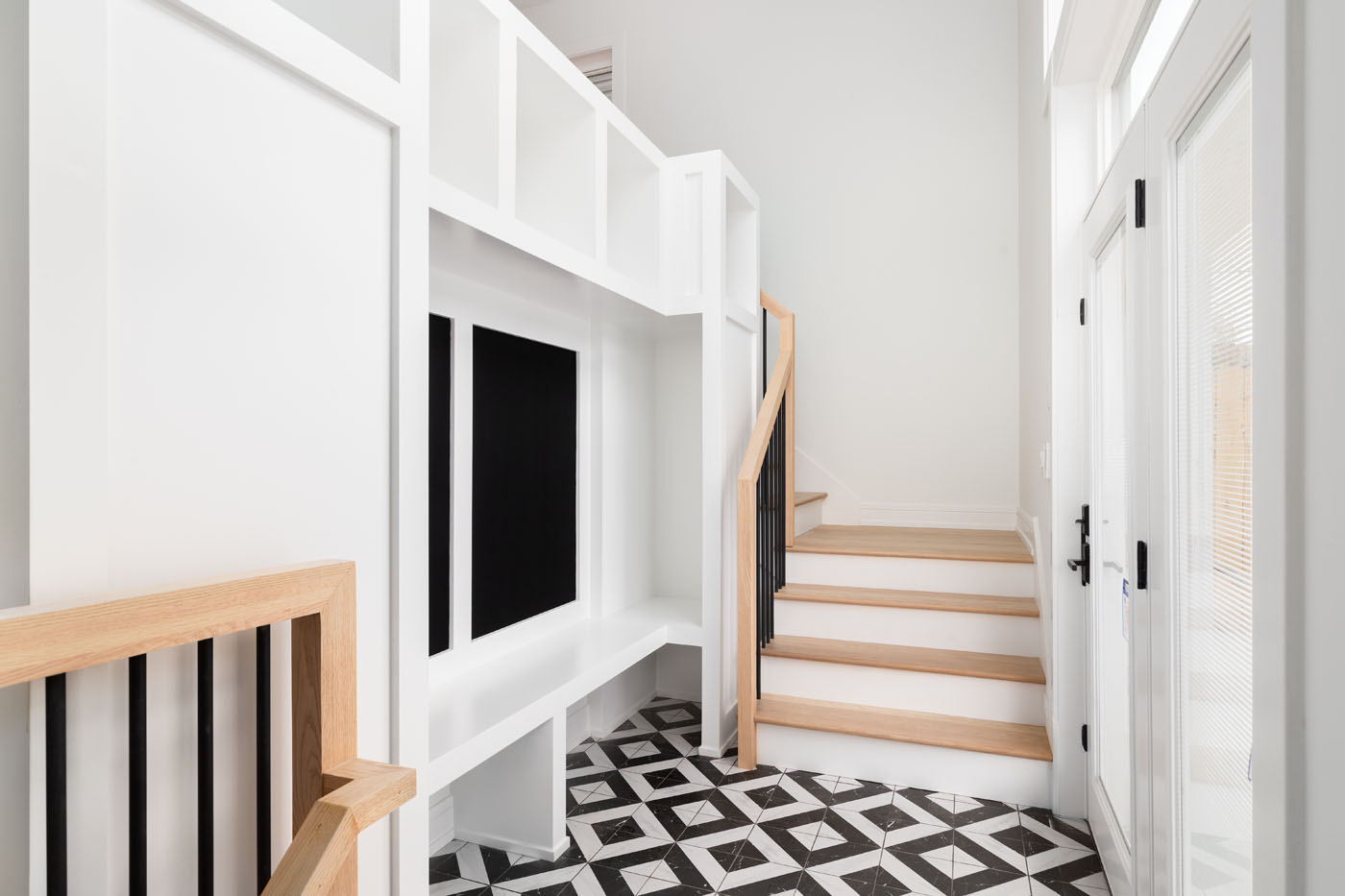 A tile job done in a mudroom space - add a Savannah mudroom backsplash installation with Footprints Floors to protect your walls.