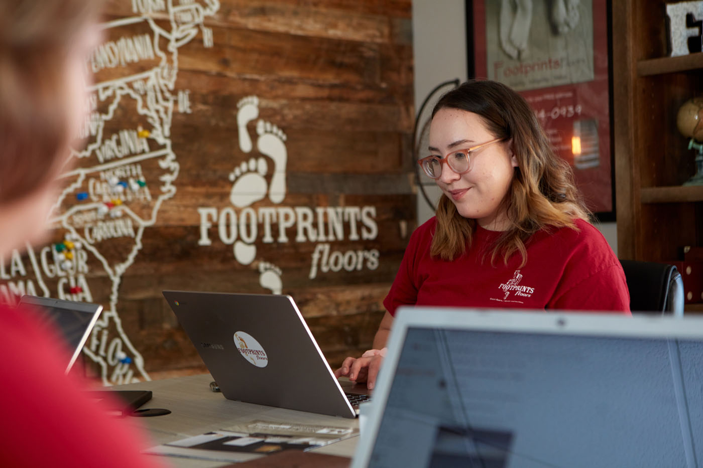 A Footprints Floors support team member ready to help our franchisees succeed.