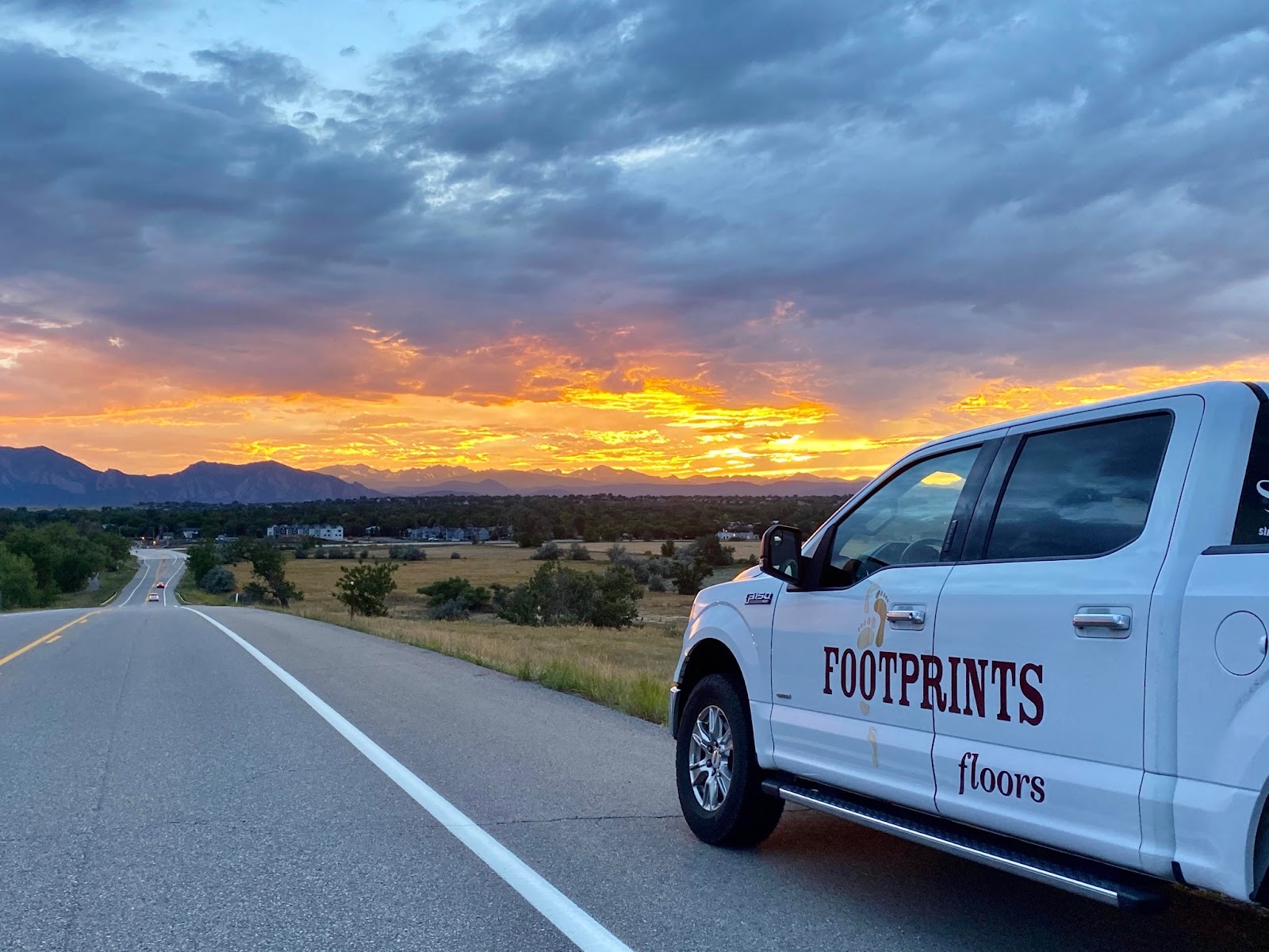 A Footprints Floors service vehicle - take the next step towards starting a flooring business by contacting our team today.