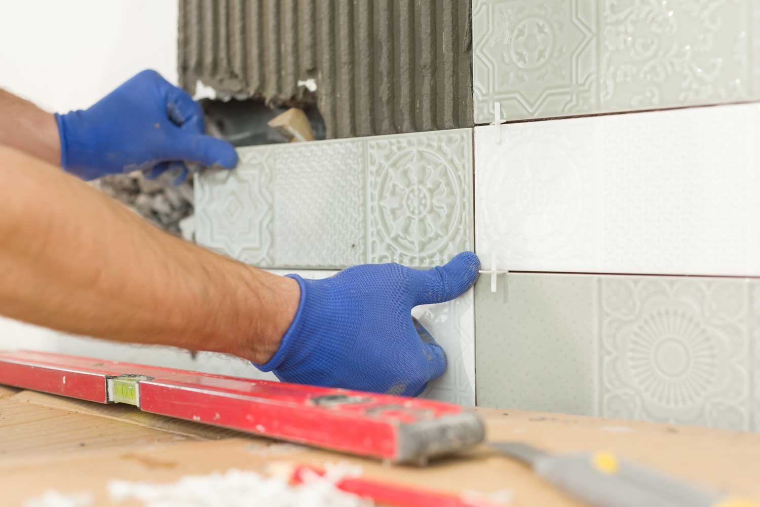 Backsplash installation with Footprints Floors.