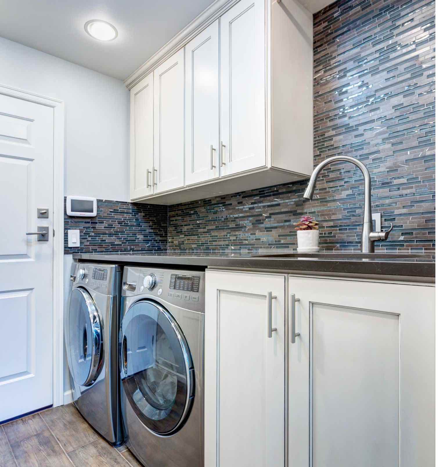 Professional backsplash installation - Footprints Floors.